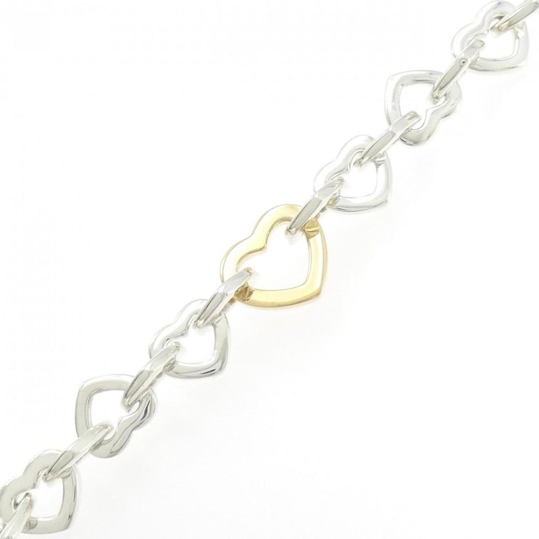 Tiffany Heart Link Bracelet: --- Catalog ---Category: SizeLength: 19cm / 7.48''Category: DesignType: Link braceletGender: WomenMaterial: Silver 925, Yellow gold (18K)Category: GeneralBrand: Tiffany--- Item List ---Section: