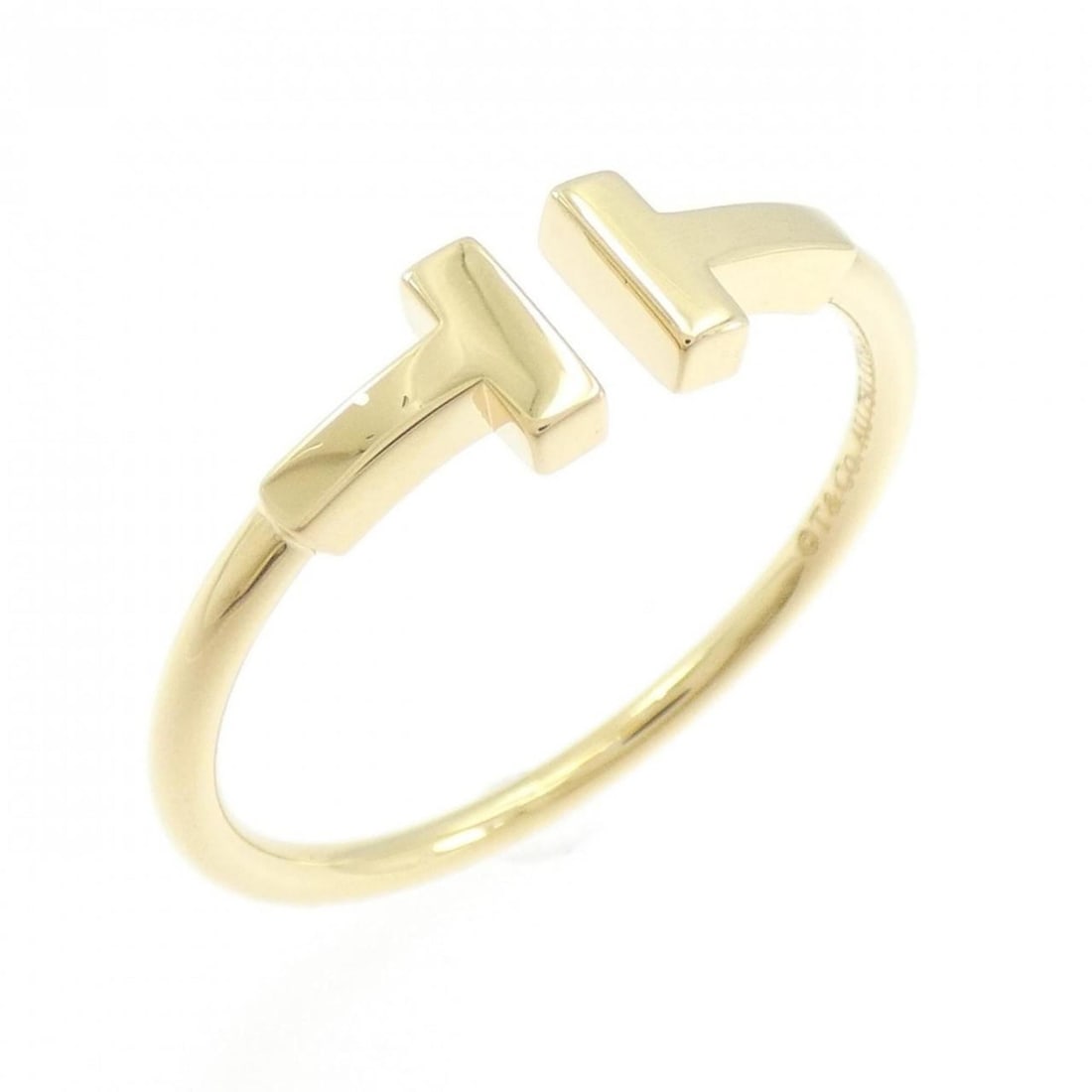 Tiffany T Wire Ring: --- Catalog ---Category: SizeJP Size: 23.5US Size: 11Category: DesignType: Band ringGender: WomenMaterial: Yellow gold (18K)Category: GeneralBrand: Tiffany--- Item List ---Section: ConditionRanking: