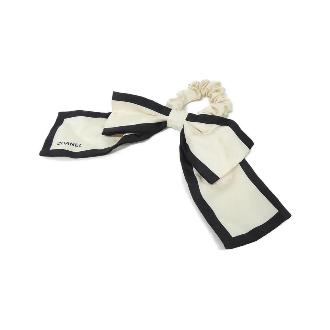 Chanel AA7530 Scrunchie: --- Catalog ---Category: SizeSize (LxW): 7cm x 31.5cm / 2.75'' x 12.4''Category: DesignType: ScrunchieColor: Black, IvoryGender: WomenMaterial: SilkCategory: GeneralMPN: AA7530Brand: Chanel--- Item Li