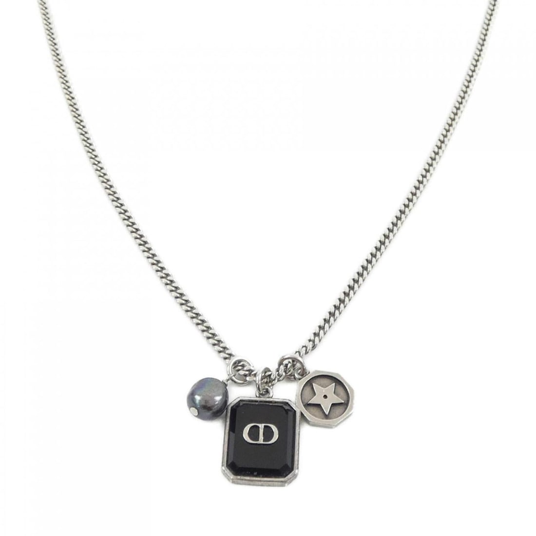Christian Dior Dior necklace: --- Catalog ---Category: SizePendant Size: 20mm x 15mm / 0.78'' x 0.59''Neck Circumference: 60.7 cm / 23.89''Category: DesignColor: Black, SilverGender: MenNecklace Type: NecklaceCategory: