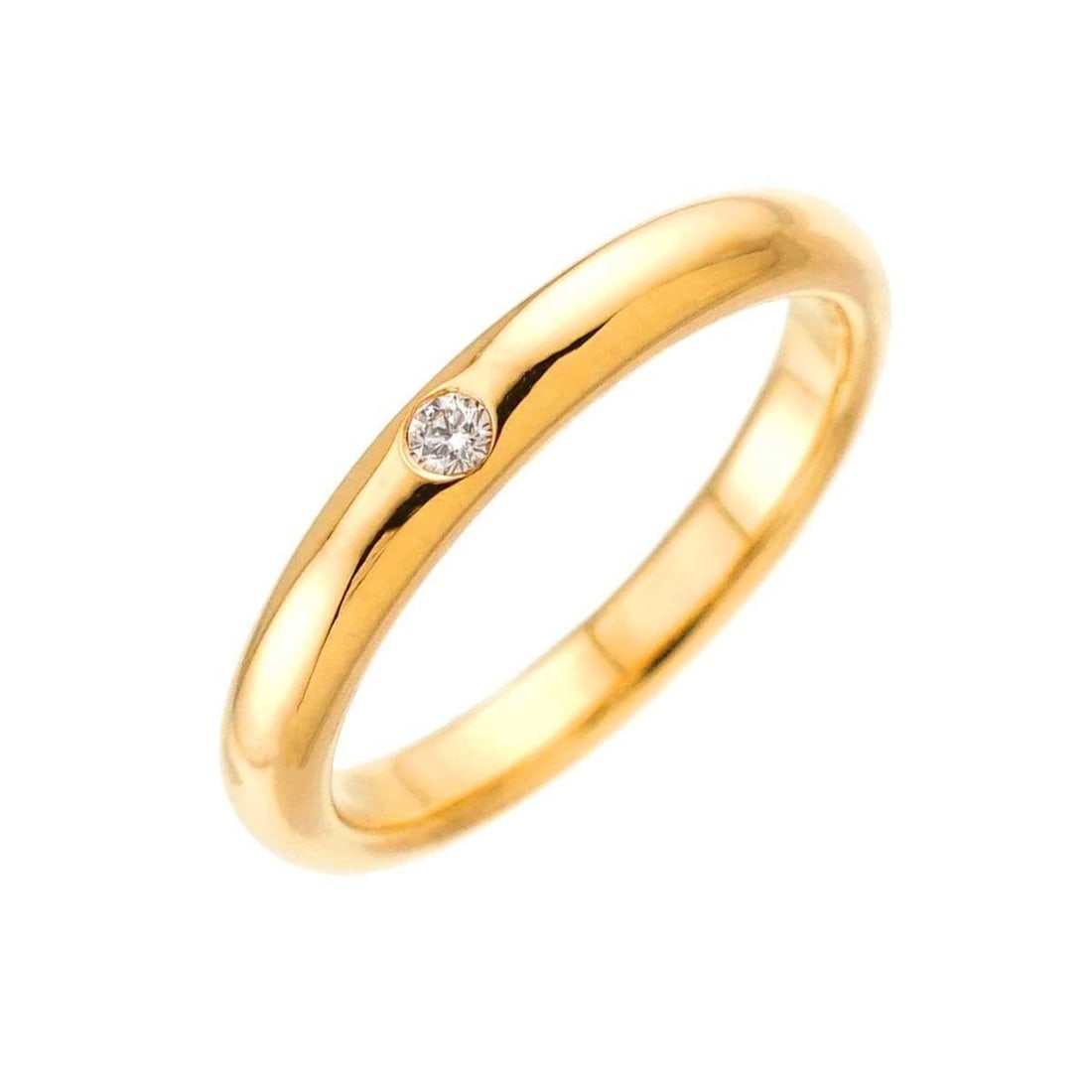 Tiffany & Co. Stacking Band Ring with 1 Diamond in 18K Yellow Gold (750): --- Catalog ---Category: SizeJP Size: 8US Size: 4.5Category: DesignType: Band ringColor: GoldGender: WomenMaterial: Yellow gold (18K)Category: GeneralBrand: Tiffany--- Item List ---Section: ConditionR