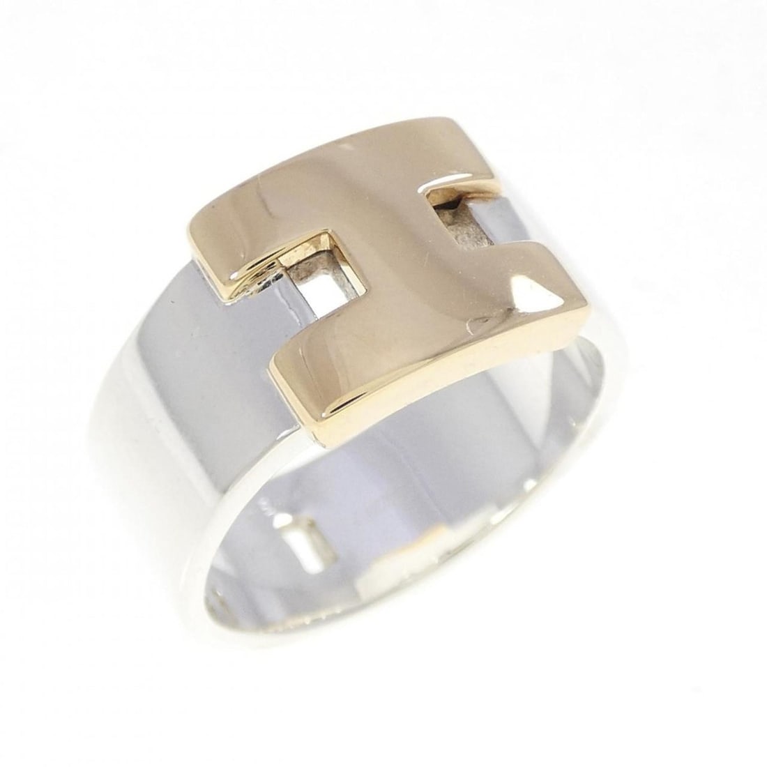 Hermes 925 750YG Ring: --- Catalog ---Category: SizeUS Size: 7.5Brand Size: 55Category: DesignType: Band ringGender: Women,MenMaterial: Silver 925, Yellow gold (18K)Category: GeneralBrand: Hermes--- Item List ---Section: