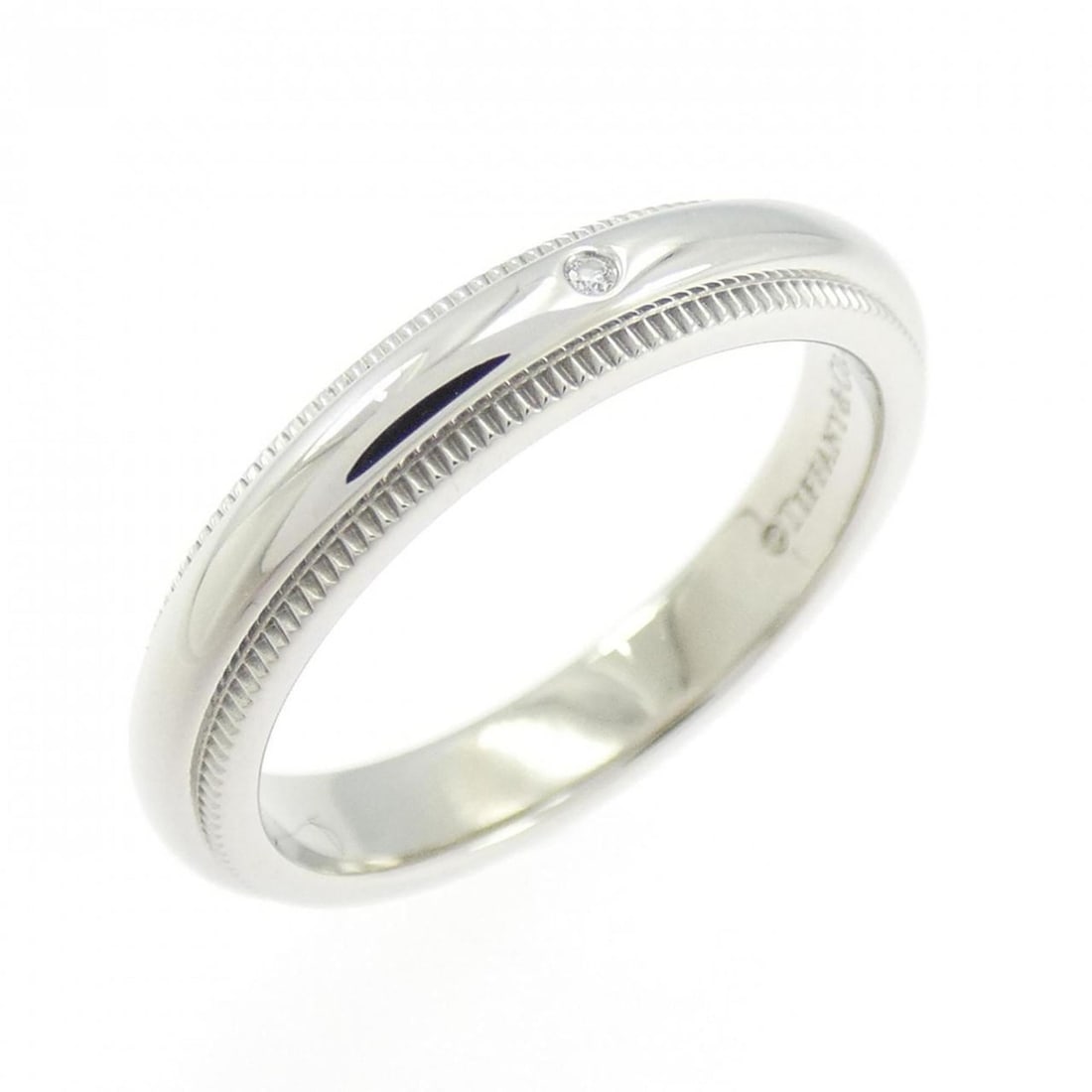 Tiffany & Co. Milgrain Ring: --- Catalog ---Category: SizeJP Size: 7.5US Size: 4Category: DesignType: Band ringColor: PlatinumStone: DiamondGender: WomenMaterial: Platinum 950Category: GeneralBrand: Tiffany--- Item List ---Sectio