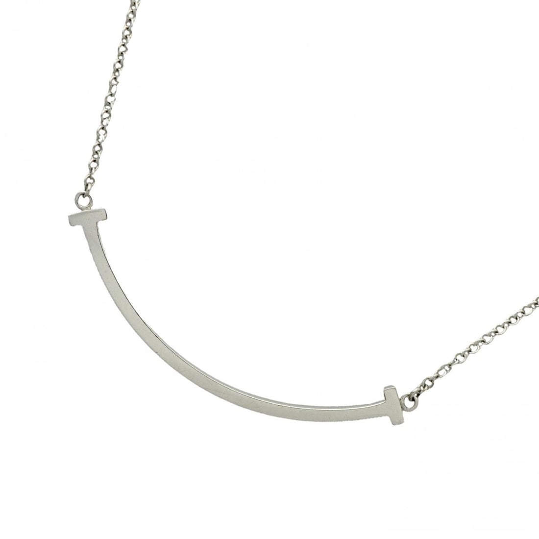 Tiffany & Co. T Smile Small Necklace, 18K White Gold, Women's: --- Catalog ---Category: SizePendant Size: 9.9mm x 37.6mm / 0.38'' x 1.48''Neck Circumference: 41 cm - 45.5 cm / 16.14'' - 17.91''Category: DesignGender: WomenMaterial: White gold (18K)Necklace Type: