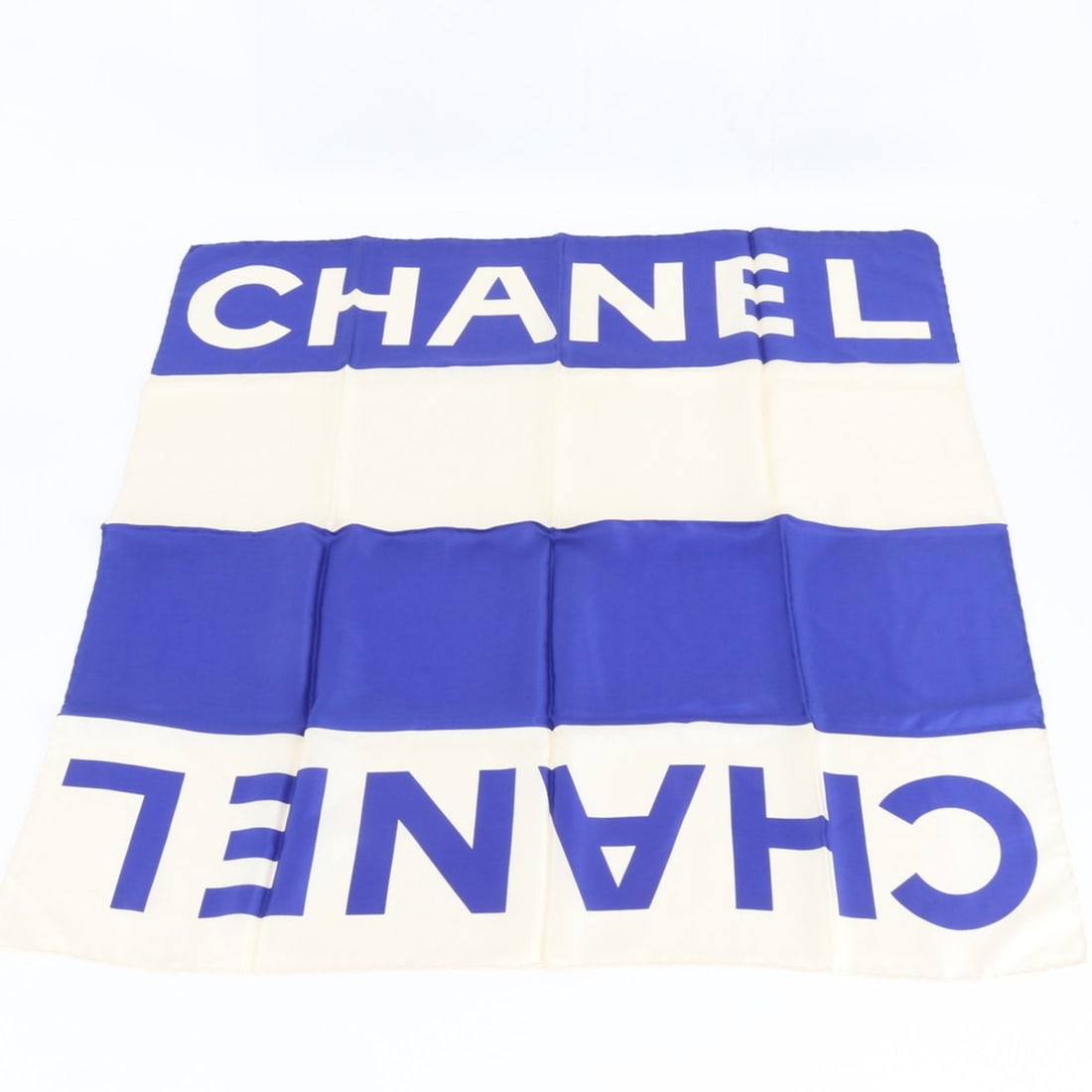Chanel Logo Blue Scarf/Muffler Brand Stole for Women: --- Catalog ---Category: SizeSize (LxW): 85cm x 85cm / 33.46'' x 33.46''Category: DesignType: ScarfColor: Beige, BlueGender: WomenCategory: GeneralBrand: Chanel--- Item List ---Section: ConditionRanki