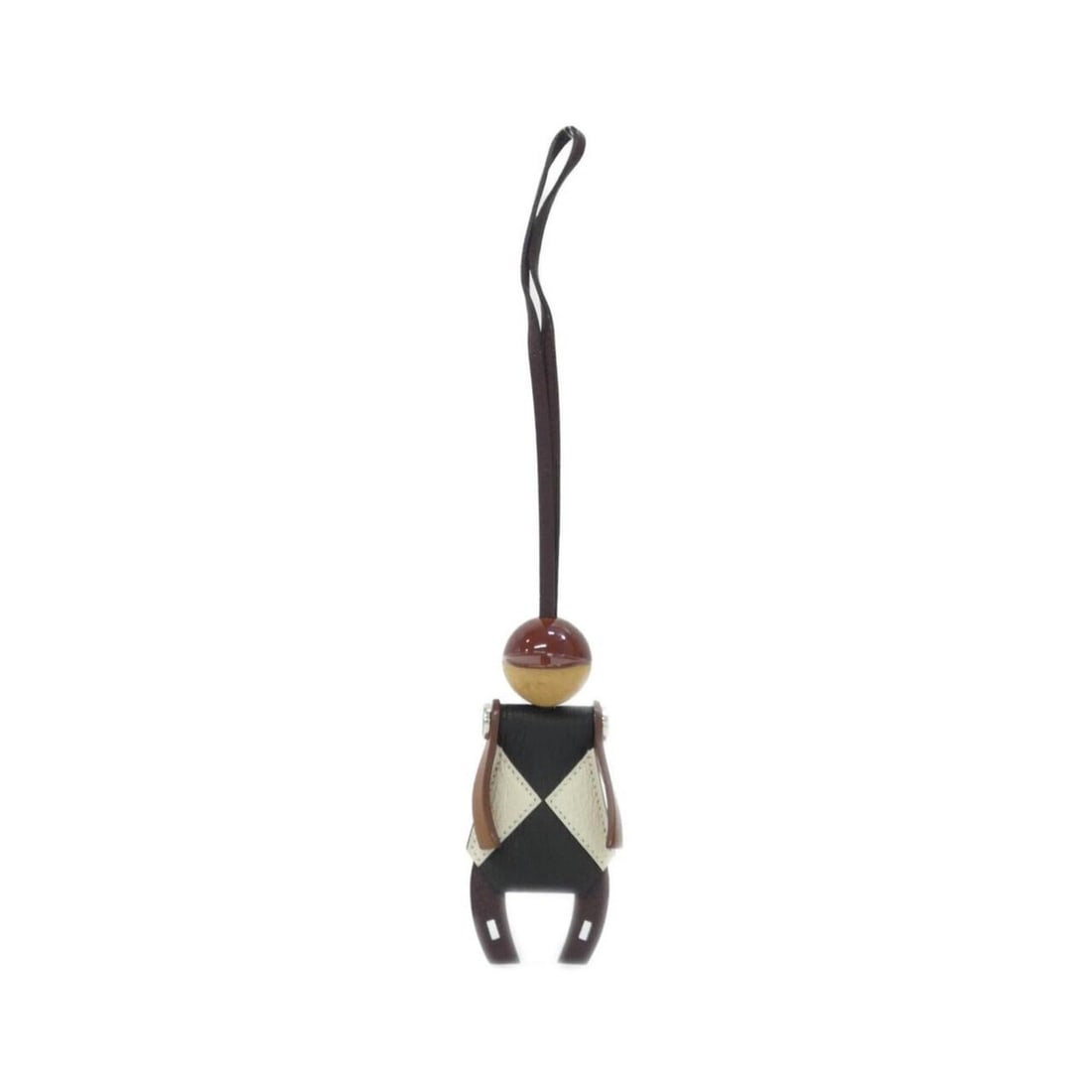 Hermes Jockey 084065CK Accessory Bag Charm: --- Catalog ---Category: SizeSize (HxWxD): 110.00mm x 50.00mm / 4.33'' x 1.97''Category: DesignType: Handbag charmColor: Black, FauveGender: Men,WomenMaterial: Barenia leather, Chevre
