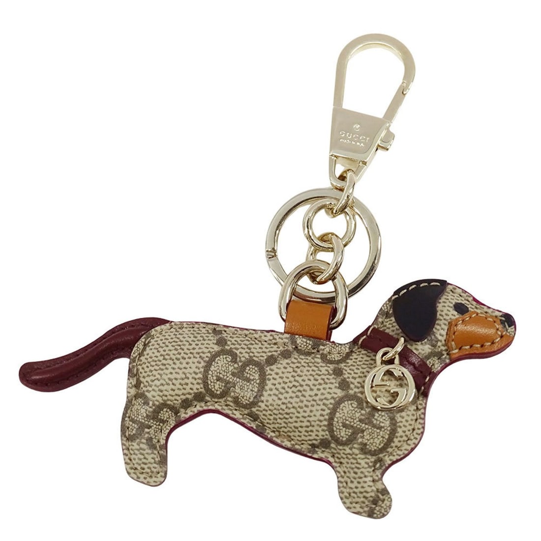 Gucci charm for women and men, dog-shaped accessory, bag charm, GG Supreme canvas, beige, dark: --- Catalog ---Category: SizeSize (HxWxD): 110.00mm x 115.00mm / 4.33'' x 4.53''Category: DesignType: Handbag charmColor: Beige, Dark brownGender: Men,WomenMaterial: GG SupremeCategory: GeneralMPN: 82