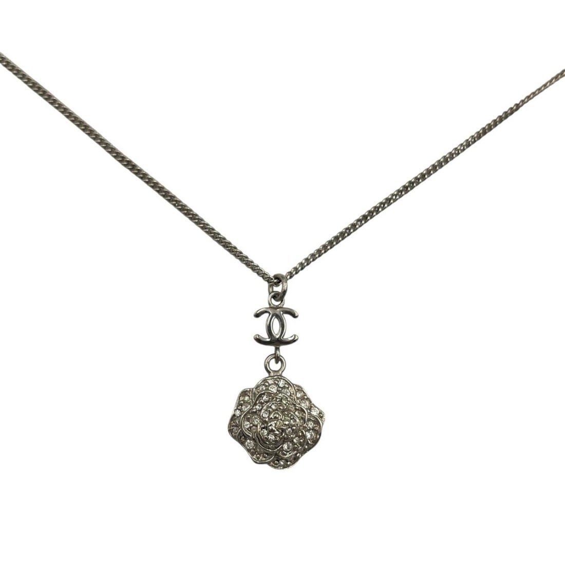 Chanel necklace, Coco Mark, Camellia pendant, rhinestones, for women.: --- Catalog ---Category: SizePendant Size: 28mm x 12mm / 1.1'' x 0.47''Neck Circumference: 42.4 cm / 16.69''Category: DesignColor: SilverGender: WomenMaterial: RhinestonePendant Type: PendantNecklace
