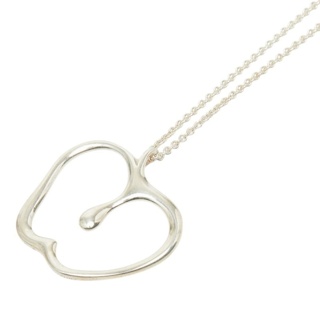 Tiffany & Co. Apple Long Necklace for Women: --- Catalog ---Category: SizePendant Size: 29.5mm x 30.2mm / 1.16'' x 1.18''Category: DesignColor: SilverGender: WomenNecklace Type: NecklaceCategory: GeneralBrand: Tiffany--- Item List ---Section: