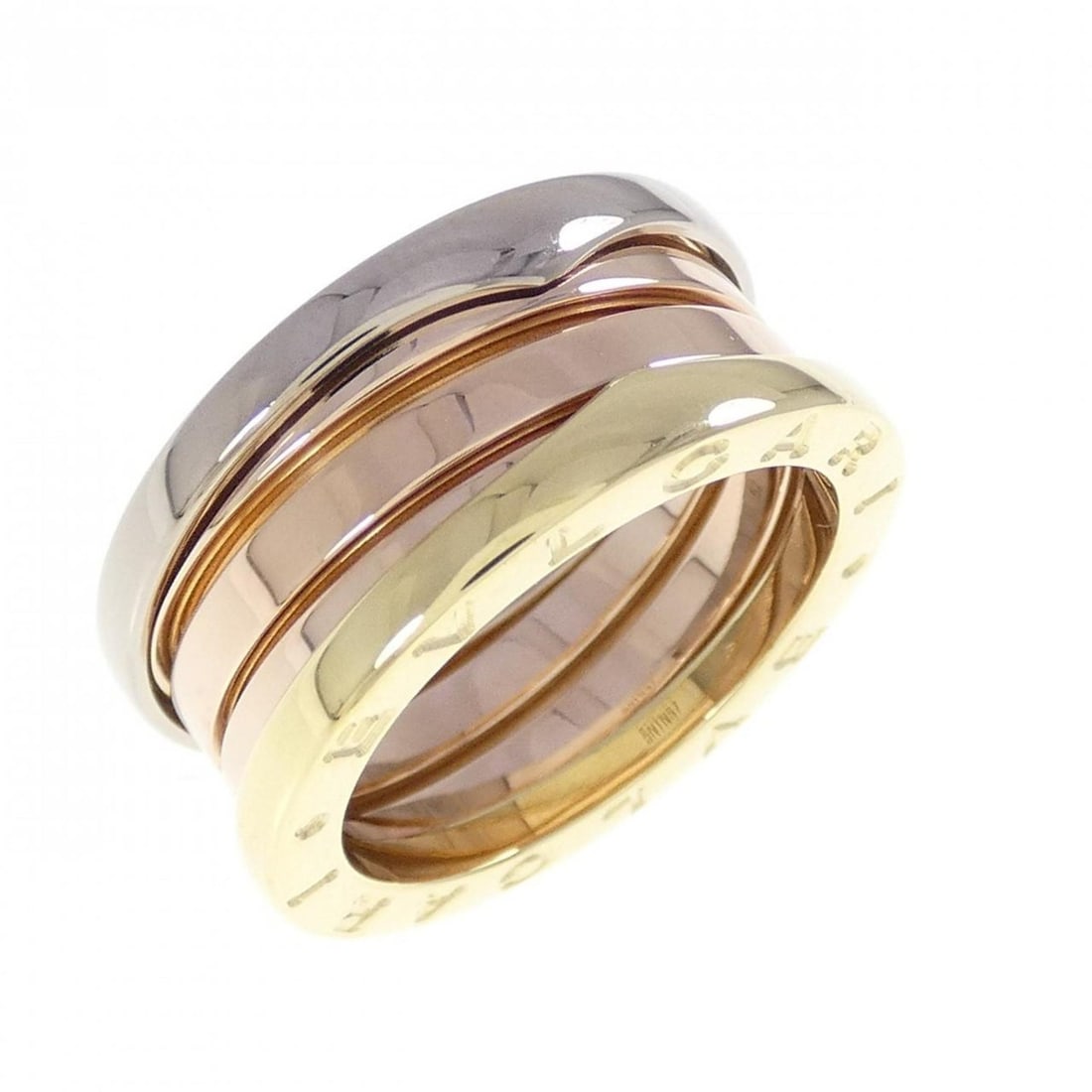 Bvlgari B.zero1 3-band ring: --- Catalog ---Category: SizeUS Size: 6.5Brand Size: 52Category: DesignType: Band ringMaterial: Pink gold (18K), White gold (18K), Yellow gold (18K)Category: GeneralBrand: Bvlgari--- Item List