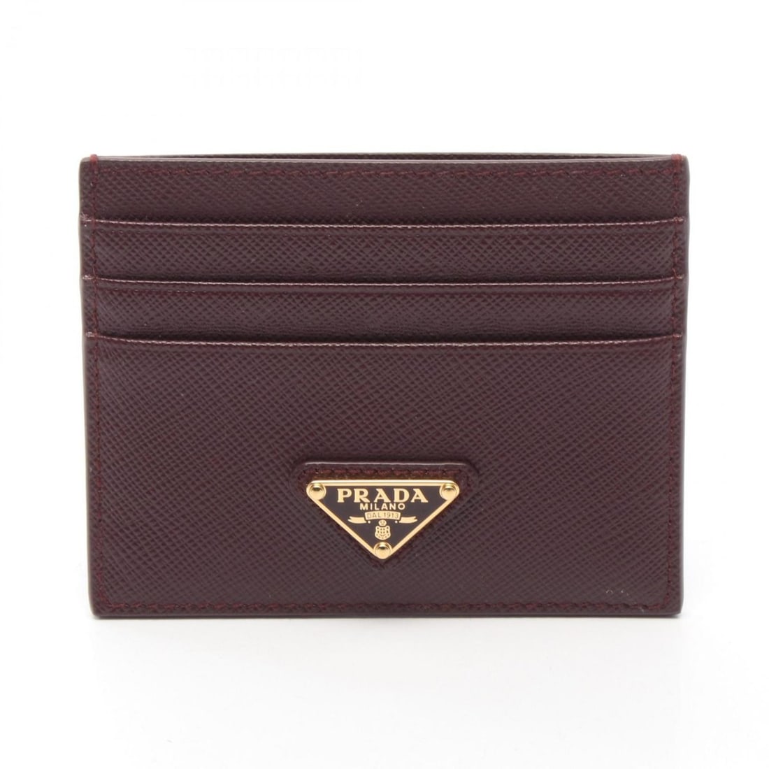 Prada SAFFIANO TRIANG Business Card Holder/Card Case, Saffiano Leather, Women's, Bordeaux (1MC025): --- Catalog ---Category: DesignType: Card caseColor: BordeauxGender: WomenMaterial: Saffiano Category: GeneralMPN: 1MC025Brand: PradaCategory: Physical PropertiesSize (HxWxD): 8cm x 10cm x 3mm /