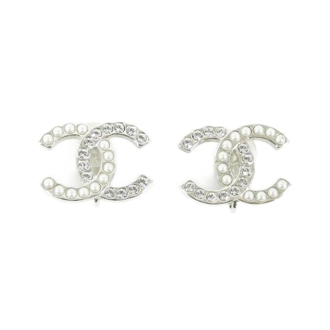 Chanel earrings: --- Catalog ---Category: SizeSize (HxWxD): 16.00mm x 21.00mm / 0.63'' x 0.83''Category: DesignType: Clip earringsColor: Silver, WhiteStone: CrystalGender: WomenCategory: GeneralBrand: Chanel--- Item L