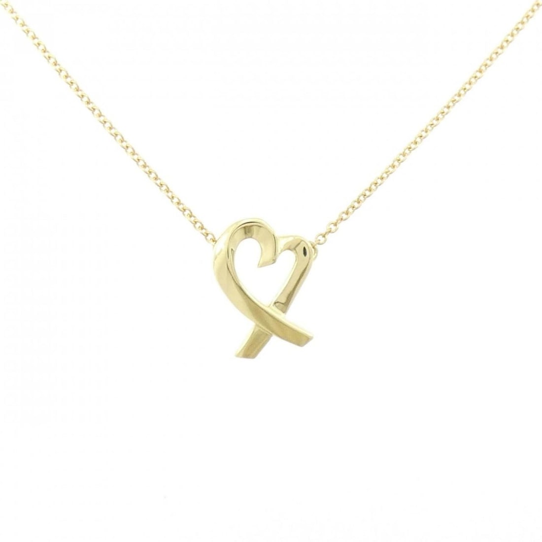 Tiffany Loving Heart Necklace: --- Catalog ---Category: SizeWidth: 1mm / 0.04''Pendant Size: 13.6mm x 9.6mm / 0.53'' x 0.37''Neck Circumference: 42 cm / 16.53''Category: DesignGender: WomenMaterial: Yellow gold (18K)Pendant Type: P