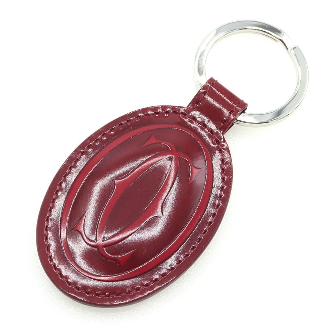 Cartier Happy Birthday Keyring L3000782 Bordeaux Leather Keychain Key Holder for Women: --- Catalog ---Category: SizeSize (HxWxD): 3.8cm x 8.6cm / 1.49'' x 3.38''Category: DesignType: KeyringColor: BordeauxGender: WomenMaterial: LeatherCategory: GeneralBrand: CartierCountry of Origin: Fr