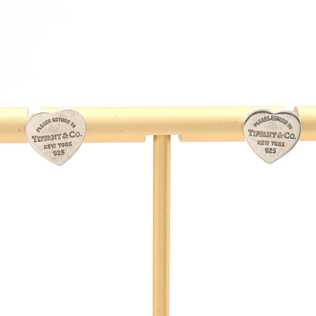 Tiffany & Co. Return to Sterling Silver 925 Earrings for Women: --- Catalog ---Category: SizeSize (HxWxD): 9.60mm x 10.00mm / 0.38'' x 0.39''Category: DesignType: Stud earringsColor: SilverGender: WomenMaterial: Sterling silver 925Category: GeneralLine: 1837 Serie