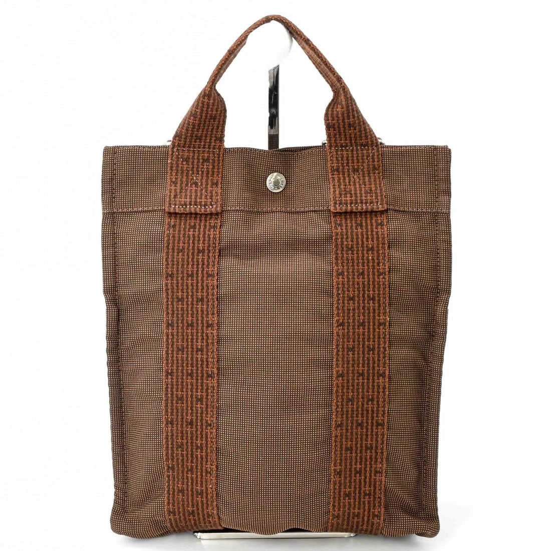 HERMES Hermes Herline Ad PM Canvas Nylon Backpack Brown: --- Catalog ---Category: SizeSize (HxWxD): 30cm x 24.5cm x 7cm / 11.81'' x 9.64'' x 2.75''Category: DesignType: BackpackColor: BrownGender: Men,Women,UnisexMaterial: Canvas Category: GeneralLine: Her