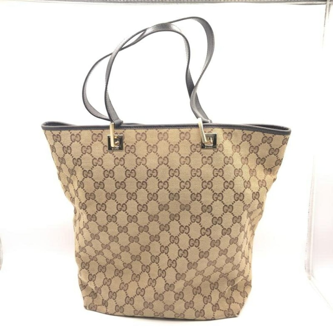 GUCCI GG Canvas Tote Bag Brown 0021098 Gucci: --- Catalog ---Category: SizeSize (HxWxD): 31cm x 36cm x 13cm / 12.2'' x 14.17'' x 5.11''Category: DesignType: Tote bagColor: BrownGender: WomenMaterial: GG canvas Category: GeneralMPN: 0021098Brand: