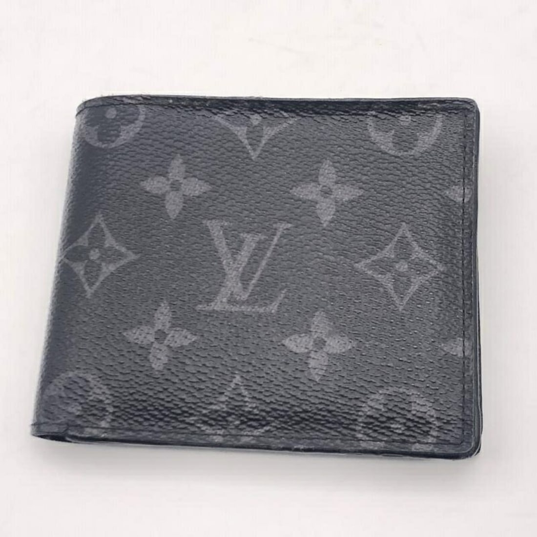 LOUIS VUITTON Portefeuille Marco NM Monogram Eclipse Bi-fold Wallet M62545 Louis Vuitton: --- Catalog ---Category: SizeSize (HxWxD): 9.3cm x 10.8cm / 3.66'' x 4.25''Category: DesignColor: Monogram EclipseGender: MenMaterial: Monogram Eclipse Category: GeneralMPN: M62545Brand: Louis