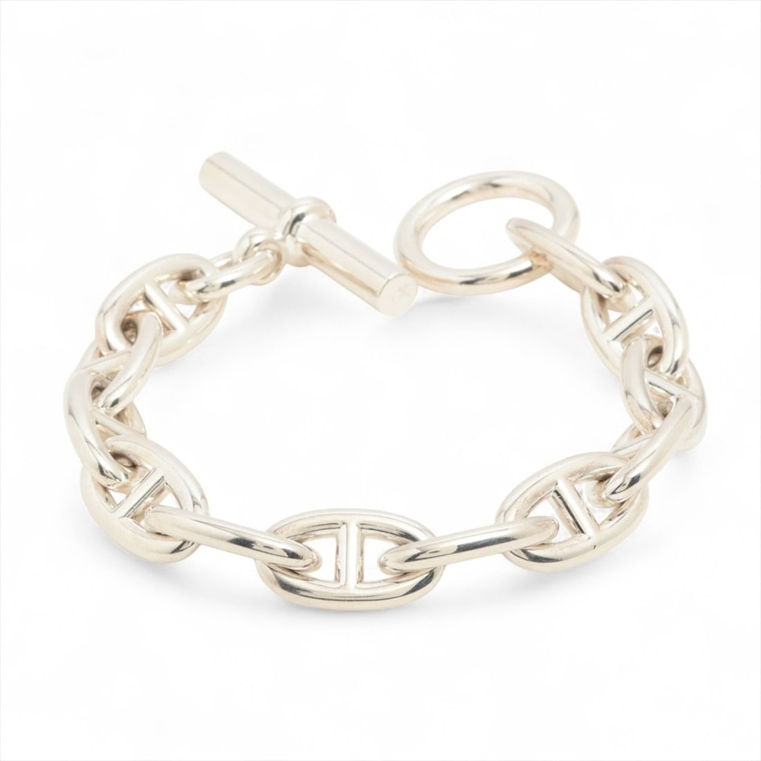 Hermes Hermès Chaine d'Ancre GM 925 12-link bracelet in silver: --- Catalog ---Category: SizeLength: 16cm / 6.29''Category: DesignType: Charm braceletColor: SilverGender: WomenCategory: GeneralBrand: HermesCountry of Origin: France--- Item List ---Section: Conditi