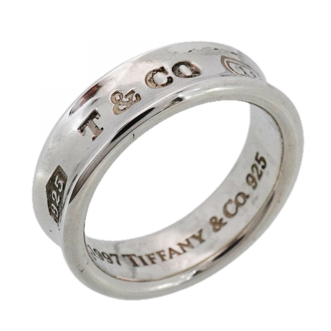 Tiffany & Co. Narrow Ring, Sterling Silver 925, Size 19, Men's: --- Catalog ---Category: SizeJP Size: 19US Size: 9.5Category: DesignType: Band ringGender: MenMaterial: Silver 925Category: GeneralBrand: Tiffany--- Item List ---Section: ConditionRanking: Rank AB Use