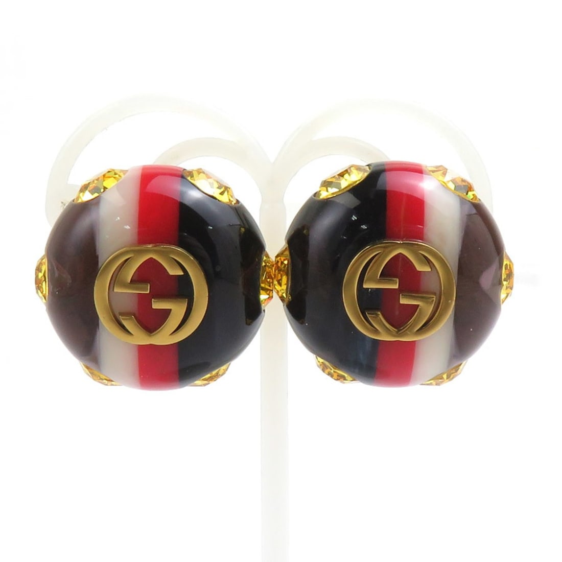 Gucci earrings, resin and metal, navy, red, white, gold, for women. Free shipping. e61619a: --- Catalog ---Category: DesignType: Stud earringsColor: Gold, Navy, Red color, WhiteGender: WomenMaterial: Metal, ResinCategory: GeneralBrand: Gucci--- Item List ---Section: ConditionRanking: Rank AB