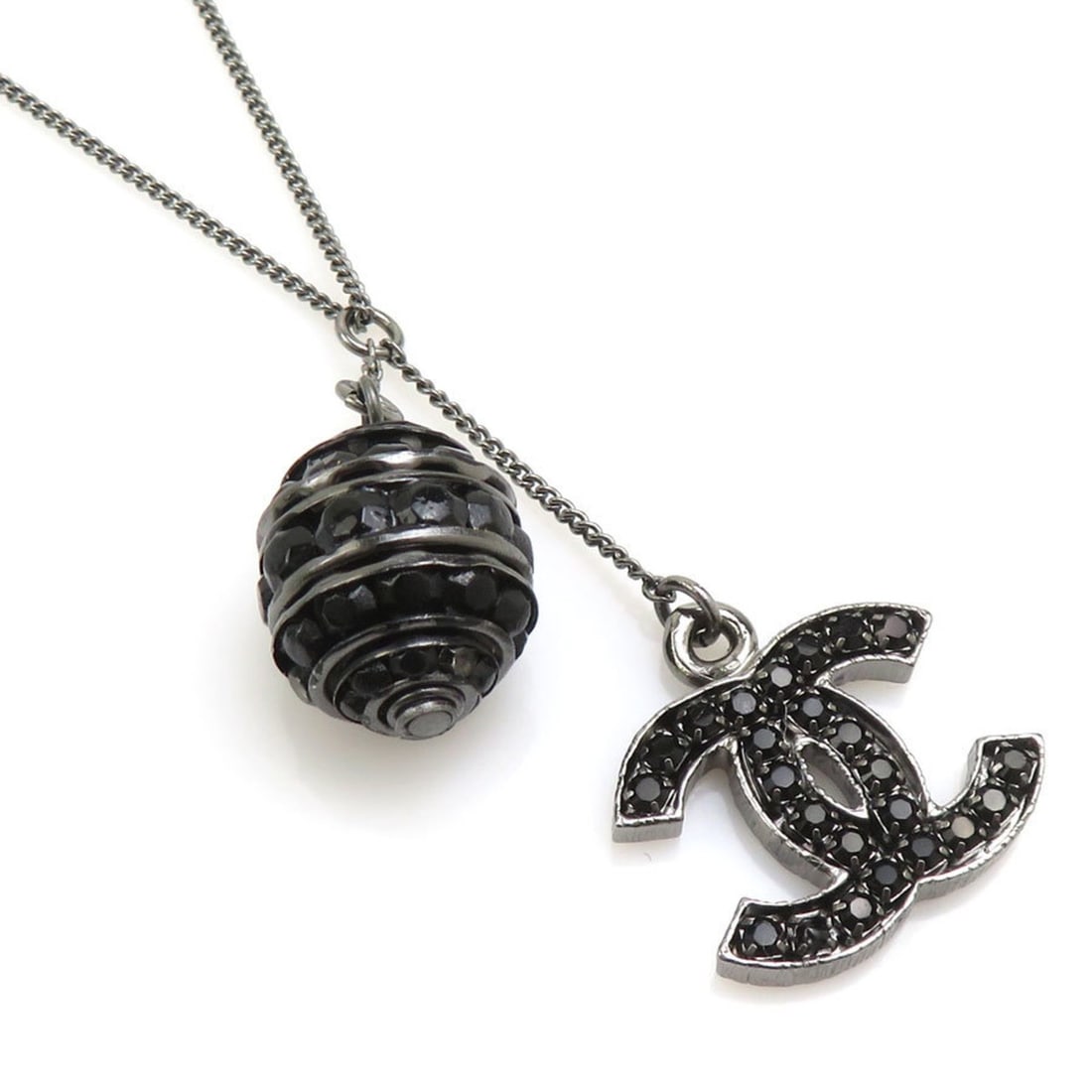 Chanel necklace, Coco Mark, metal, rhinestone, gunmetal, black, women's, free shipping, e61616a: --- Catalog ---Category: SizePendant Size: 15mm x 20mm / 0.59'' x 0.78''Neck Circumference: 41 cm - 59 cm / 16.14'' - 23.22''Category: DesignColor: Black, GunmetalGender: WomenMaterial: Metal, Rhinest