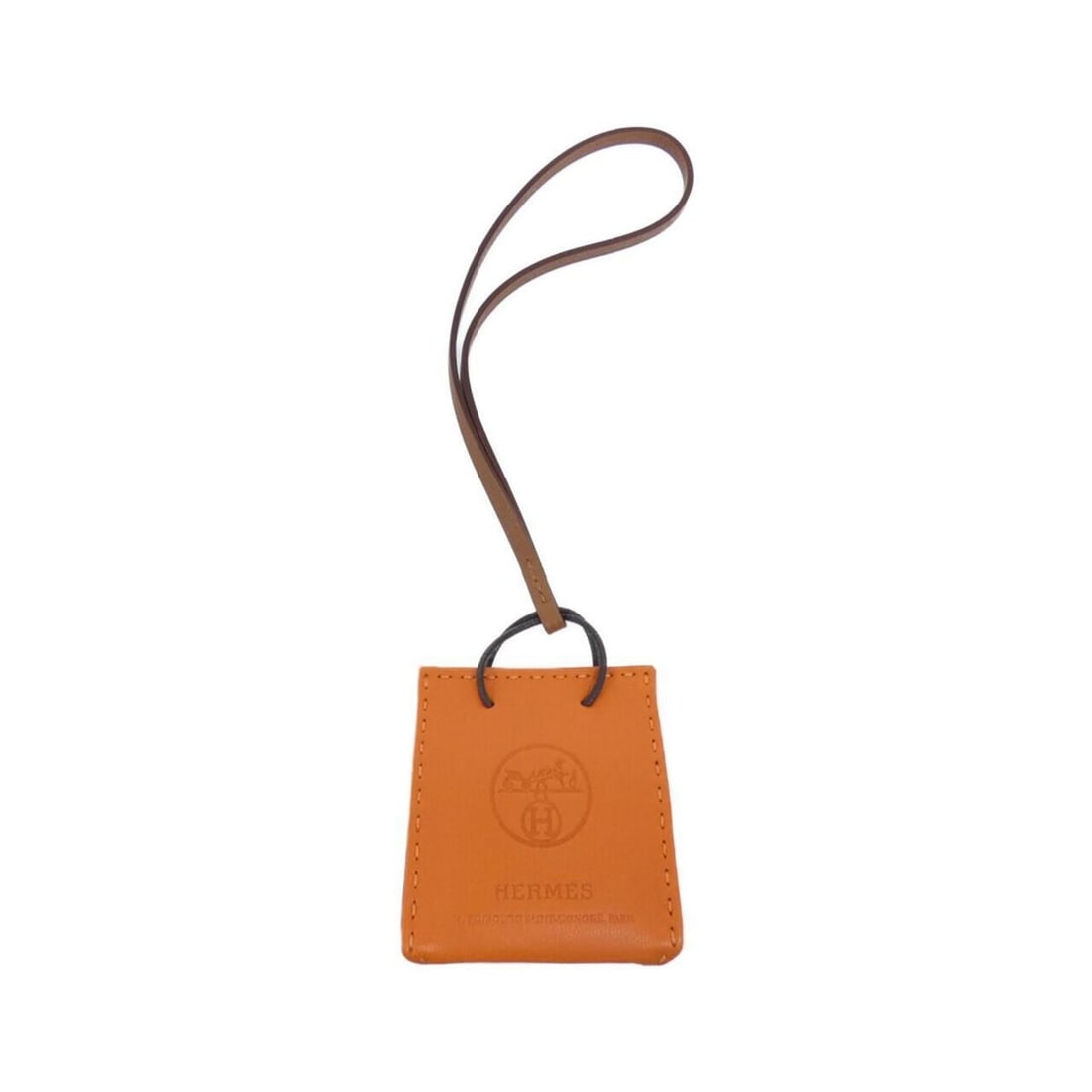 Hermes Sac Orange Accessory Bag Charm 079065CA: --- Catalog ---Category: SizeSize (HxWxD): 7.00mm x 5.00mm / 0.28'' x 0.20''Category: DesignType: Handbag charmColor: OrangeGender: WomenMaterial: Agneau MiloCategory: GeneralMPN: 079065CABrand: