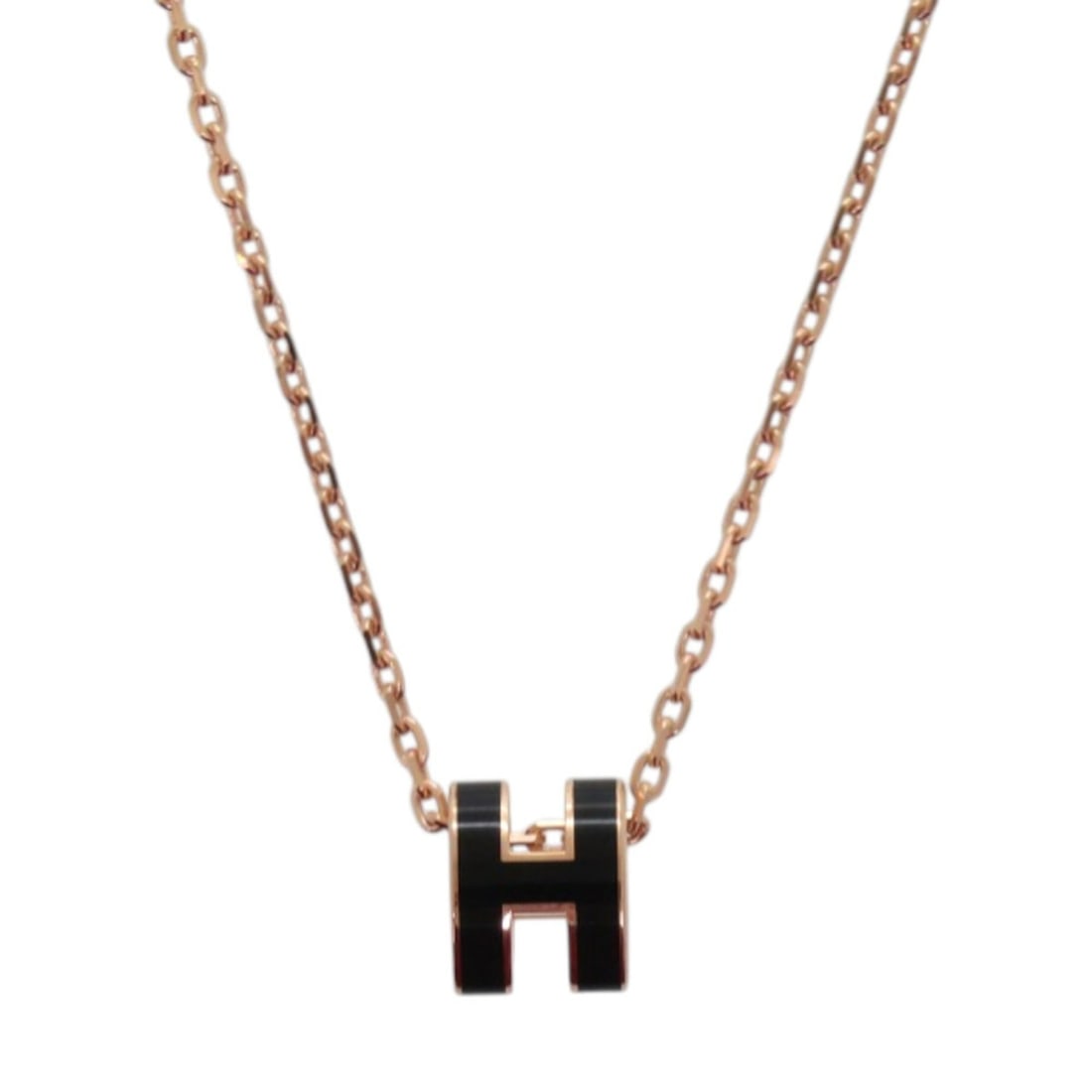 Unused Hermes Mini Pop H Metal Black Necklace 0487HERMES: --- Catalog ---Category: SizePendant Size: 8mm x 7mm / 0.31'' x 0.27''Neck Circumference: 40 cm / 15.74''Category: DesignColor: Black, Pink goldGender: WomenMaterial: MetalNecklace Type: NecklaceCateg