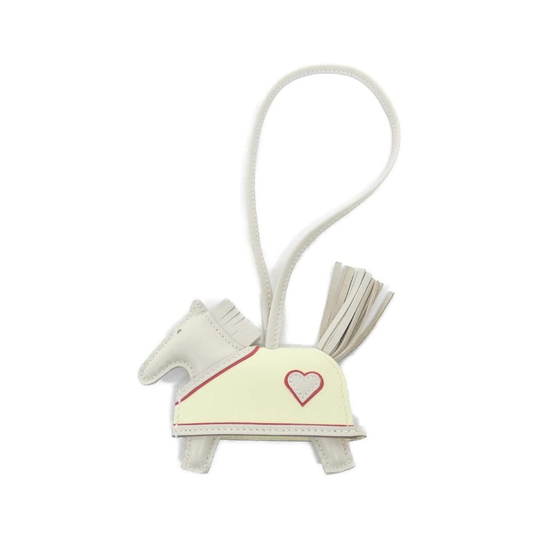 Hermes Rodeo Robeo Coeur PM 086714CA Accessory Bag Charm: --- Catalog ---Category: SizeSize (HxWxD): 75.00mm x 85.00mm / 2.95'' x 3.35''Category: DesignType: Handbag charmColor: WhiteGender: Men,WomenMaterial: Agneau Milo, Swift leatherCategory: GeneralMPN: