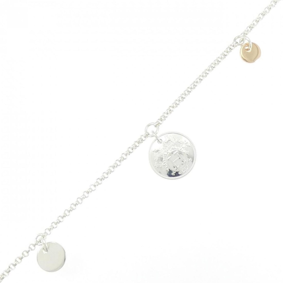 Hermes Hermès Ex-Libris PM Bracelet: --- Catalog ---Category: SizeWidth: 1.87cm / 0.73''Weight: 5.7g / 0.2oz.Total Length: 16cm / 6.29''Category: DesignType: Charm braceletGender: WomenMaterial: Pink gold (18K), Silver 925Category: