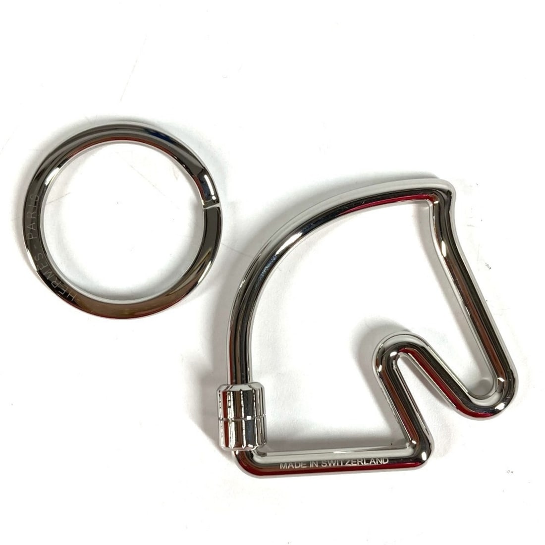 HERMES Horse Cheval Keyring Accessory Bag Charm Keychain Metal Men's Women's Silver Like New: --- Catalog ---Category: DesignType: KeyringColor: SilverGender: Men,WomenCategory: GeneralBrand: HermesCountry of Origin: Switzerland--- Item List ---Section: ConditionRanking: Rank S Used - Mint con