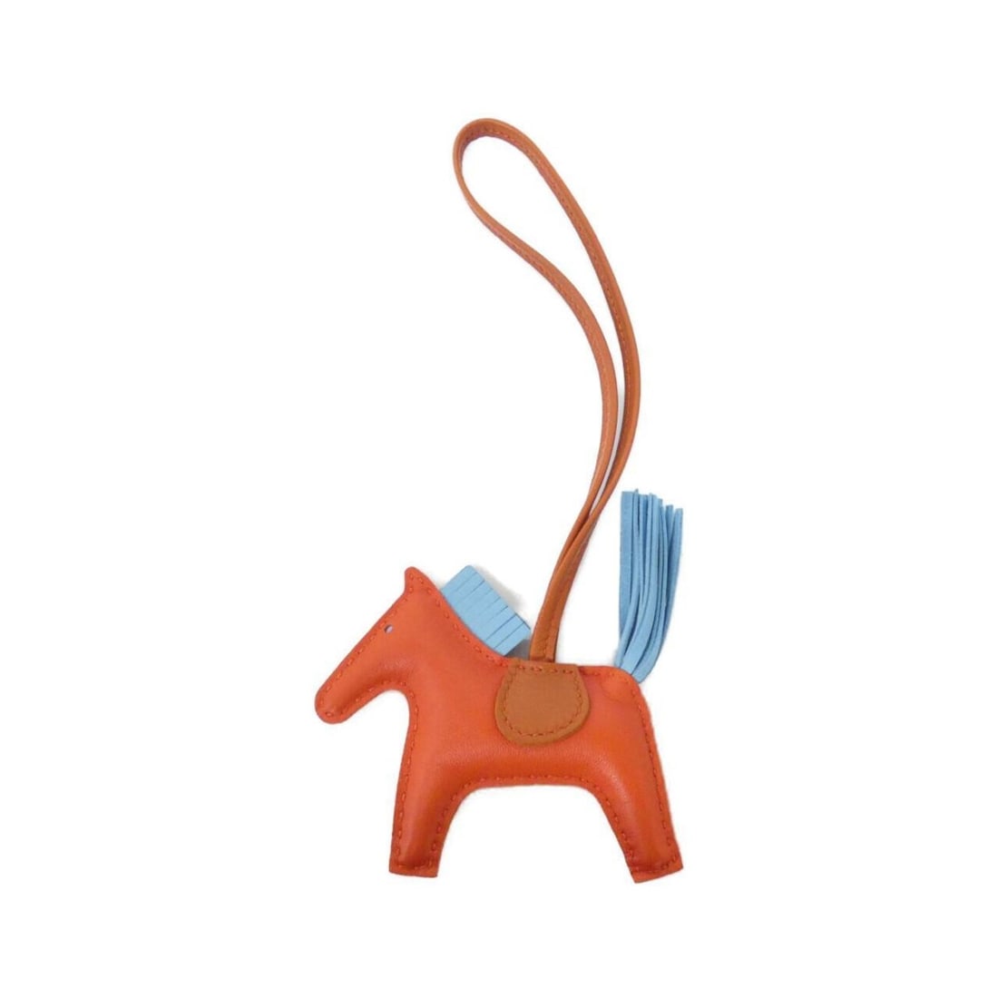 Hermes Rodeo Accessory Bag Charm PM 064929CA: --- Catalog ---Category: SizeSize (HxWxD): 70.00mm x 80.00mm / 2.76'' x 3.15''Category: DesignType: Handbag charmColor: Capucine, CelesteStone: CarnelianGender: Men,WomenMaterial: Agneau