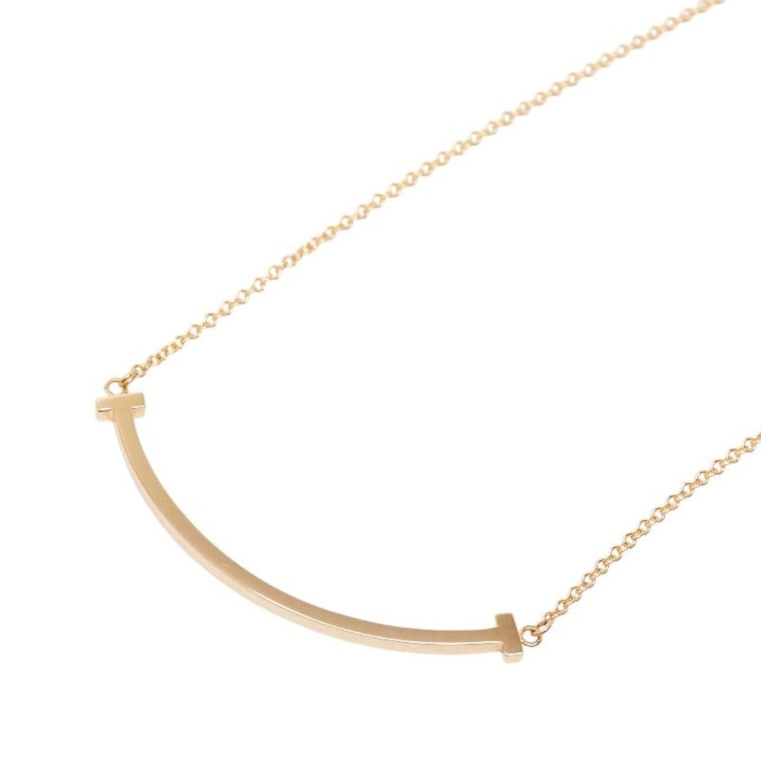 Tiffany & Co. T Smile Pendant Small Necklace Pink Gold 18KPG Au750 Women's TIFFANY&Co.: --- Catalog ---Category: SizePendant Size: 9.4mm x 37.6mm / 0.37'' x 1.48''Neck Circumference: 45 cm / 17.71''Category: DesignColor: Pink goldGender: WomenMaterial: Pink gold (18K)Necklace Type: Neckl