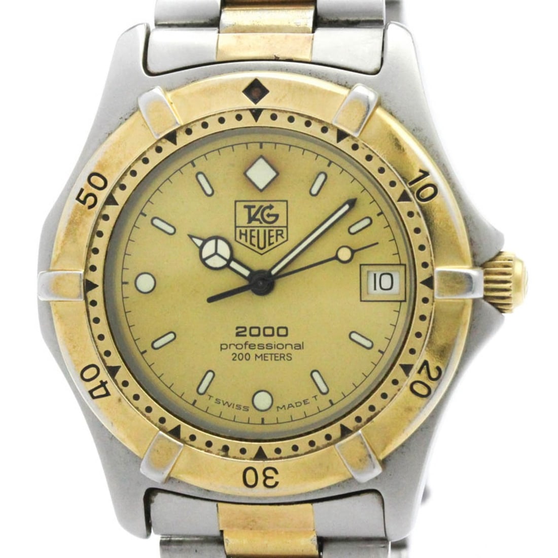 TAG HEUER Professional Gold Plated Steel Quartz Mens Watch 964.006 Vintage: --- Catalog ---Category: SizeCase Diameter: 37mm / 1.46''Category: DesignType: WristwatchStyle: SportGender: MenColor (Dial): GoldMaterial (Band): Gold plated, Stainless steelMaterial (Case): Gold pla