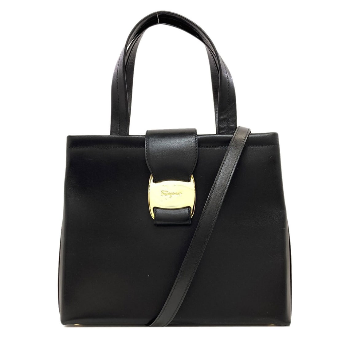 Salvatore Ferragamo Vara Hardware 2-Way Leather Handbag for Women: --- Catalog ---Category: SizeSize (HxWxD): 20cm x 24cm x 11cm / 7.87'' x 9.44'' x 4.33''Category: DesignType: HandbagColor: BlackGender: WomenMaterial: Leather Category: GeneralBrand: Salvatore Ferrag