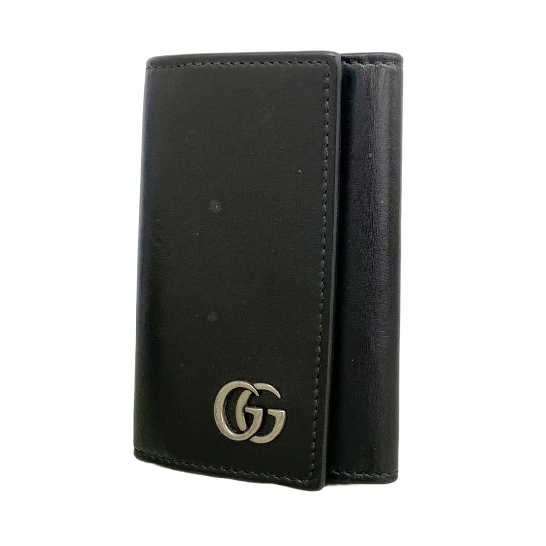 Gucci GG Marmont 435305 Leather Key Case for Men: --- Catalog ---Category: DesignType: KeycaseColor: BlackGender: MenMaterial: Leather Category: GeneralMPN: 435305Brand: GucciCategory: Physical PropertiesSize (HxWxD): 7.5cm x 11cm x 2.5cm / 2.95'' x