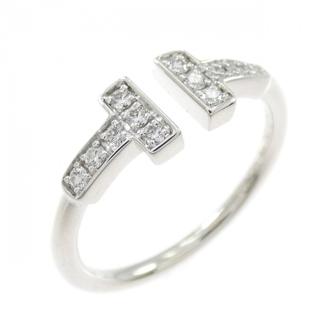 Tiffany T Wire Ring: --- Catalog ---Category: SizeWeight: 2.6g / 0.09oz.JP Size: 10US Size: 5.5Category: DesignType: Band ringStone: DiamondGender: WomenMaterial: White gold (18K)Category: GeneralBrand: Tiffany--- Item Li