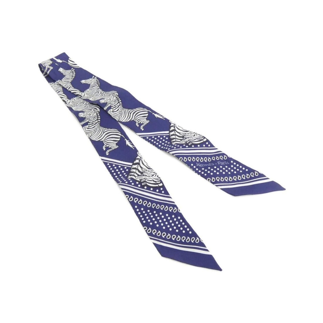 Hermes LES ZEBRES Twilly 063265S Scarf Muffler: --- Catalog ---Category: SizeSize (LxW): 5cm x 86cm / 1.96'' x 33.85''Category: DesignType: ScarfColor: Black, WhiteGender: Women,MenMaterial: Silk Category: GeneralMPN: 063265SBrand: Hermes--- Item L