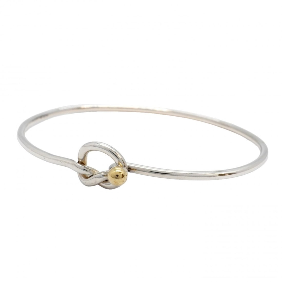 Tiffany & Co. Hook Eye Bangle, 18K Yellow Gold (KYG), Sterling Silver 925, Women's: --- Catalog ---Category: SizeLength: 16.5cm / 6.49''Category: DesignType: BangleGender: WomenMaterial: Silver 925, Yellow gold (18K)Category: GeneralBrand: Tiffany--- Item List ---Section: ConditionRa