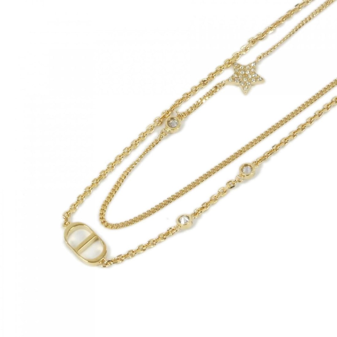 Christian Dior Petite CD N1155PMTCY Necklace: --- Catalog ---Category: SizePendant Size: 7mm x 11mm / 0.27'' x 0.43''Neck Circumference: 41 cm / 16.14''Category: DesignColor: Clear, GoldGender: WomenNecklace Type: NecklaceCategory: GeneralMPN: N1