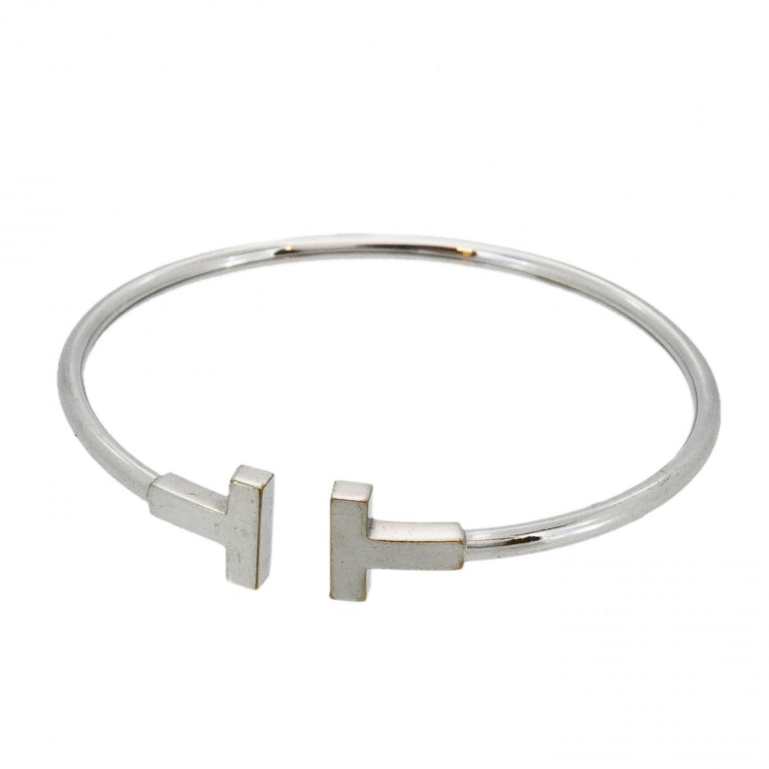 Tiffany & Co. T-Wire Bangle, 18K White Gold, Women's: --- Catalog ---Category: SizeLength: 15cm / 5.9''Category: DesignType: BangleGender: WomenMaterial: White gold (18K)Category: GeneralBrand: Tiffany--- Item List ---Section: ConditionRanking: Rank AB U