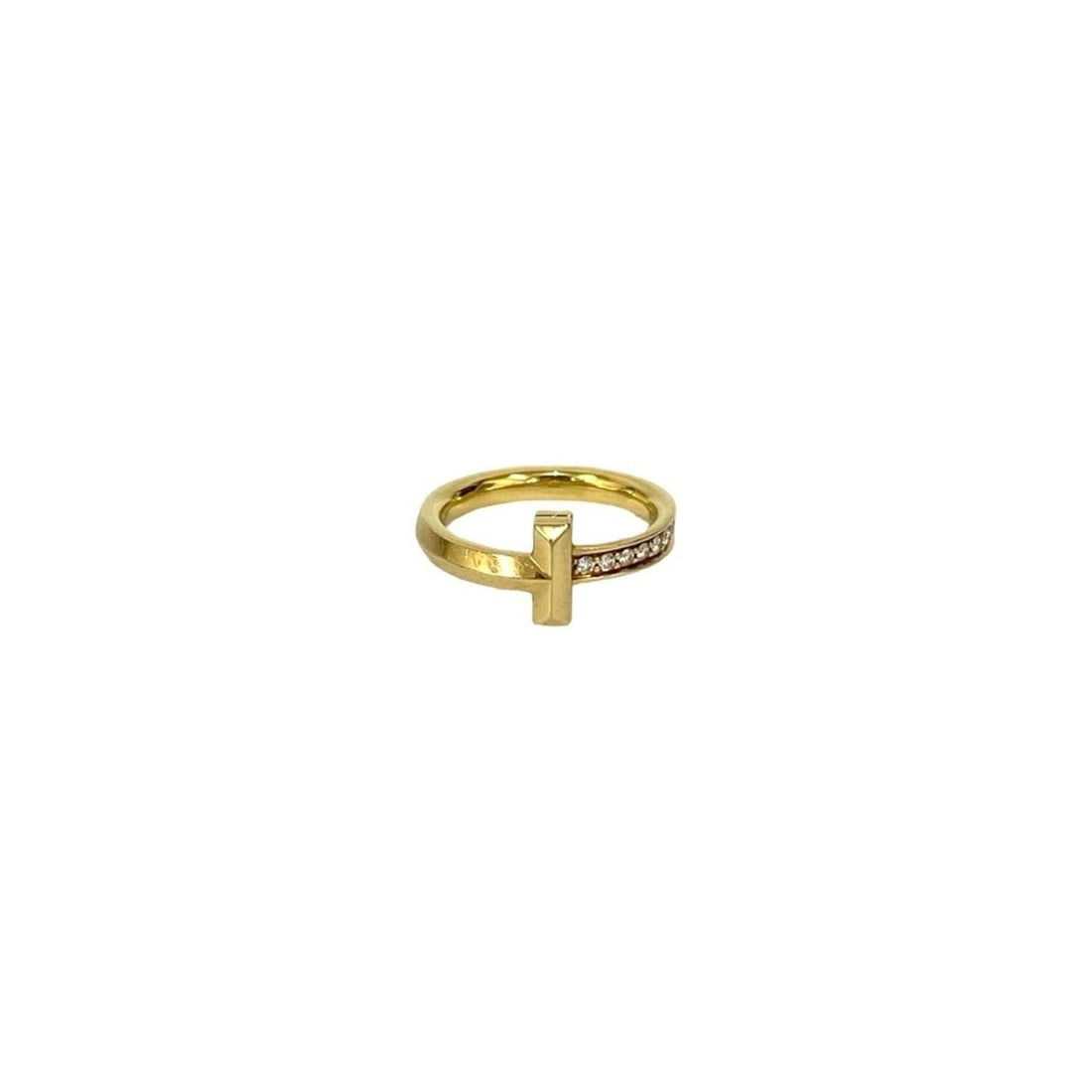 TIFFANY & Co. Tiffany T One Ring, 750 Diamond, 18K Yellow Gold, Size 4, Item No. 37654: --- Catalog ---Category: PackNumber in Pack: 1Category: SizeJP Size: 4US Size: 3Category: DesignType: Band ringColor: GoldGender: WomenMaterial: Yellow gold (18K)Category: GeneralBrand: Tiffany--- Ite