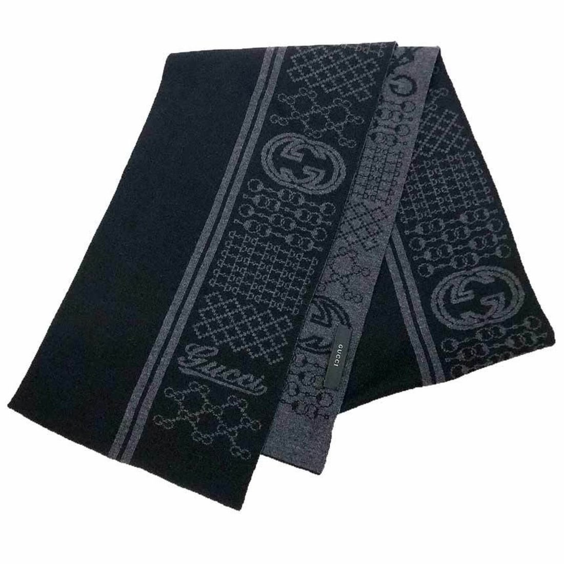 GUCCI wool scarf in black and gray with GG bit pattern interlocking G logo.: --- Catalog ---Category: SizeSize (LxW): 1.78m x 26cm / 70.07'' x 10.23''Category: DesignType: StoleColor: Black, GrayGender: Women,MenMaterial: Wool Category: GeneralBrand: GucciCountry of Origin: It
