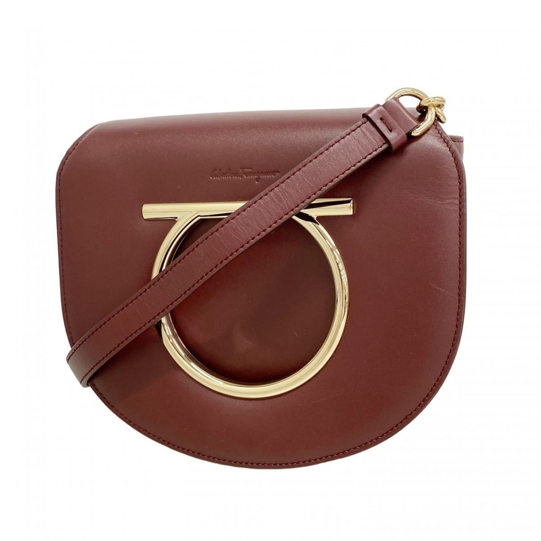 Salvatore Ferragamo Gancini Leather Shoulder Bag, Bordeaux/Champagne, Women's: --- Catalog ---Category: SizeSize (HxWxD): 19cm x 17.5cm x 8cm / 7.48'' x 6.88'' x 3.14''Category: DesignType: Shoulder bagColor: BordeauxGender: WomenMaterial: Leather Hardware Color: Champagne goldC