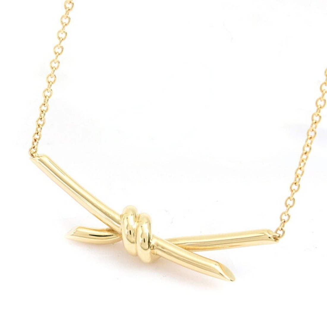 Tiffany & Co. Women's Knot Pendant Necklace, Yellow Gold 750YG (18K): --- Catalog ---Category: SizePendant Size: 10.2mm x 38.8mm / 0.4'' x 1.52''Neck Circumference: 43 cm / 16.92''Category: DesignColor: GoldGender: WomenMaterial: Yellow gold (18K)Pendant Type: PendantNe