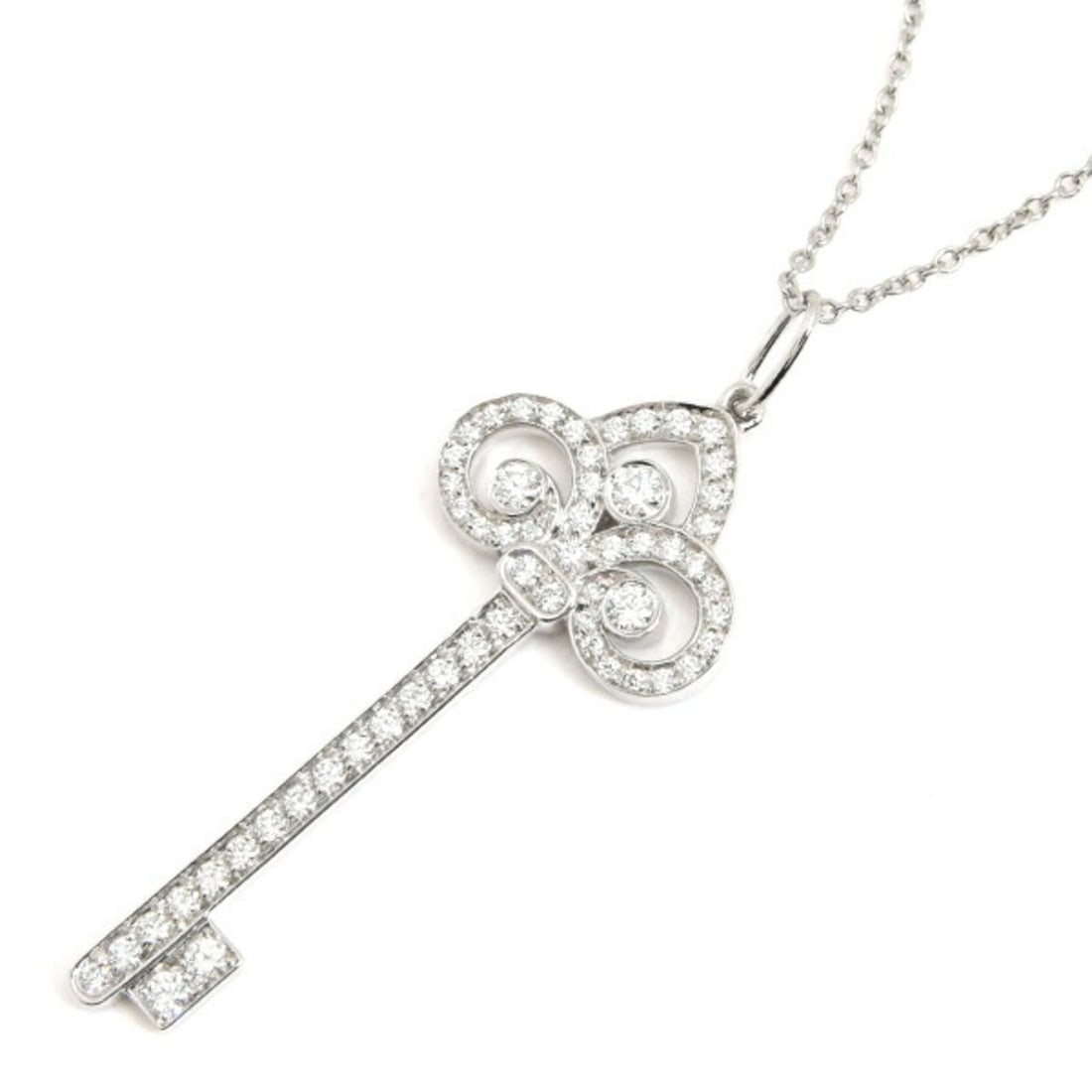 Tiffany & Co. Women's Fleur-de-lis Key Diamond Necklace, Platinum (PT950): --- Catalog ---Category: SizePendant Size: 36.8mm x 15mm / 1.44'' x 0.59''Neck Circumference: 42 cm / 16.53''Category: DesignColor: SilverGender: WomenMaterial: Platinum 950Necklace Type: NecklaceCate