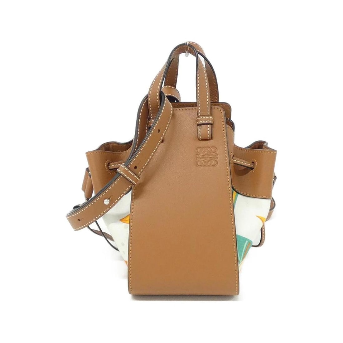 Loewe Hammock Drawstring Mini 328 72 V07 Shoulder Bag: --- Catalog ---Category: SizeWeight: 310g / 10.93oz.Size (HxWxD): 20cm x 18cm x 16cm / 7.87'' x 7.08'' x 6.29''Strap Length: 108cm - 124cm / 42.51'' - 48.81''Handle Length: 15cm / 5.9''Category: Desig