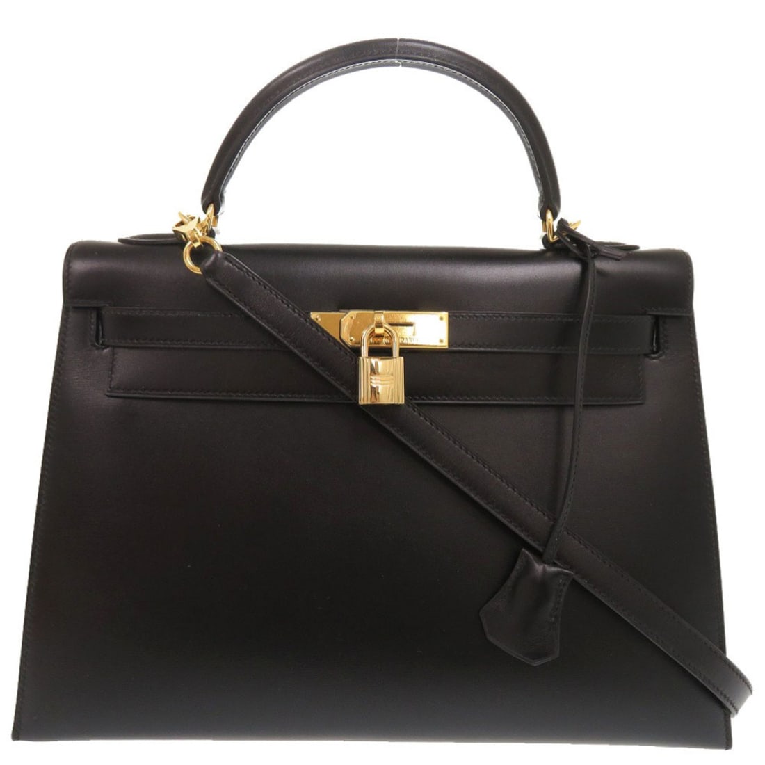 Excellent condition Hermes Kelly 32, external stitching, box calf leather, black, gold hardware,: --- Catalog ---Category: SizeSize (HxWxD): 23cm x 32cm x 12cm / 9.05'' x 12.59'' x 4.72''Category: DesignType: HandbagColor: BlackGender: WomenMaterial: Box calf leather Category: GeneralBrand: Hermes