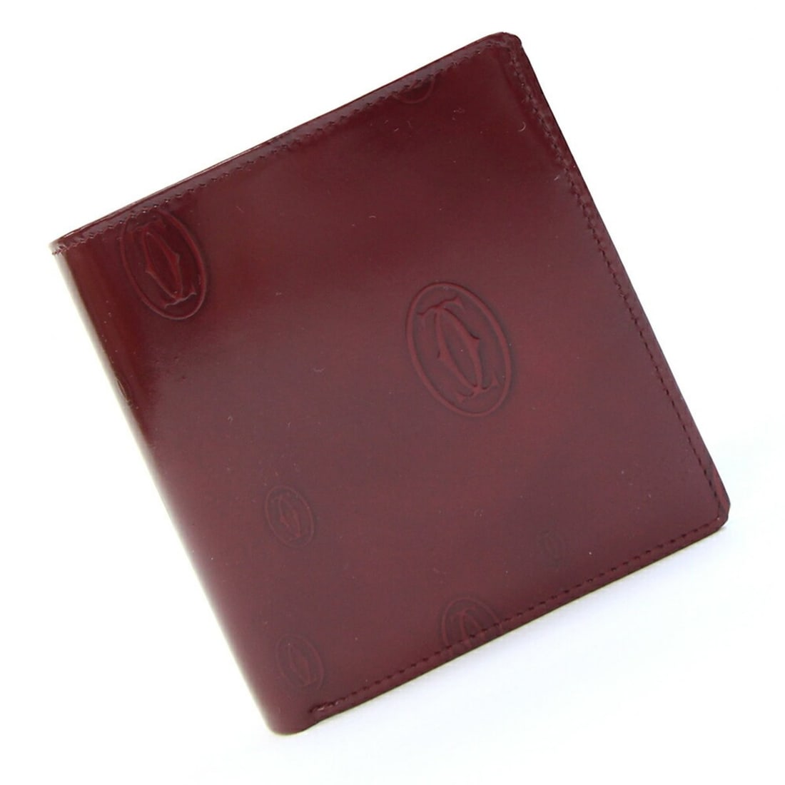 Cartier Bi-fold Wallet Happy Birthday L3000263 Bordeaux Enamel Leather Compact Folding Burgundy: --- Catalog ---Category: SizeSize (HxWxD): 10cm x 10.5cm x 2.5cm / 3.93'' x 4.13'' x 0.98''Category: DesignType: Wallet (bi-fold)Color: BordeauxGender: WomenMaterial: Leather Leather/Fur Type: Enamel