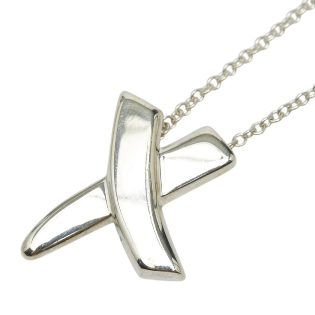 Tiffany & Co. Paloma Picasso Kiss Cross Pendant Necklace, Sterling Silver (SV925), Women's.: --- Catalog ---Category: SizePendant Size: 13.8mm x 11.5mm / 0.54'' x 0.45''Neck Circumference: 41 cm / 16.14''Category: DesignColor: SilverGender: WomenMaterial: Silver 925Necklace Type: NecklaceCate